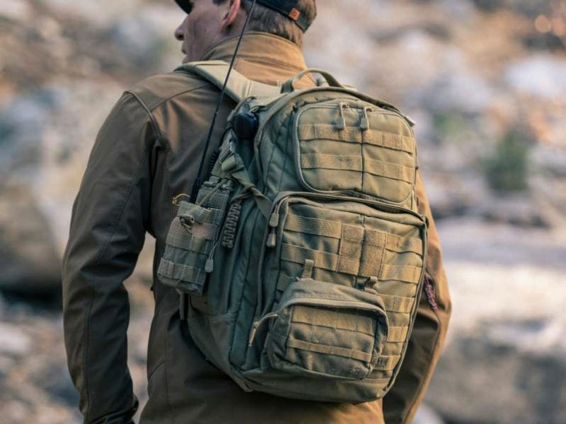 Man wearing tactical backpack